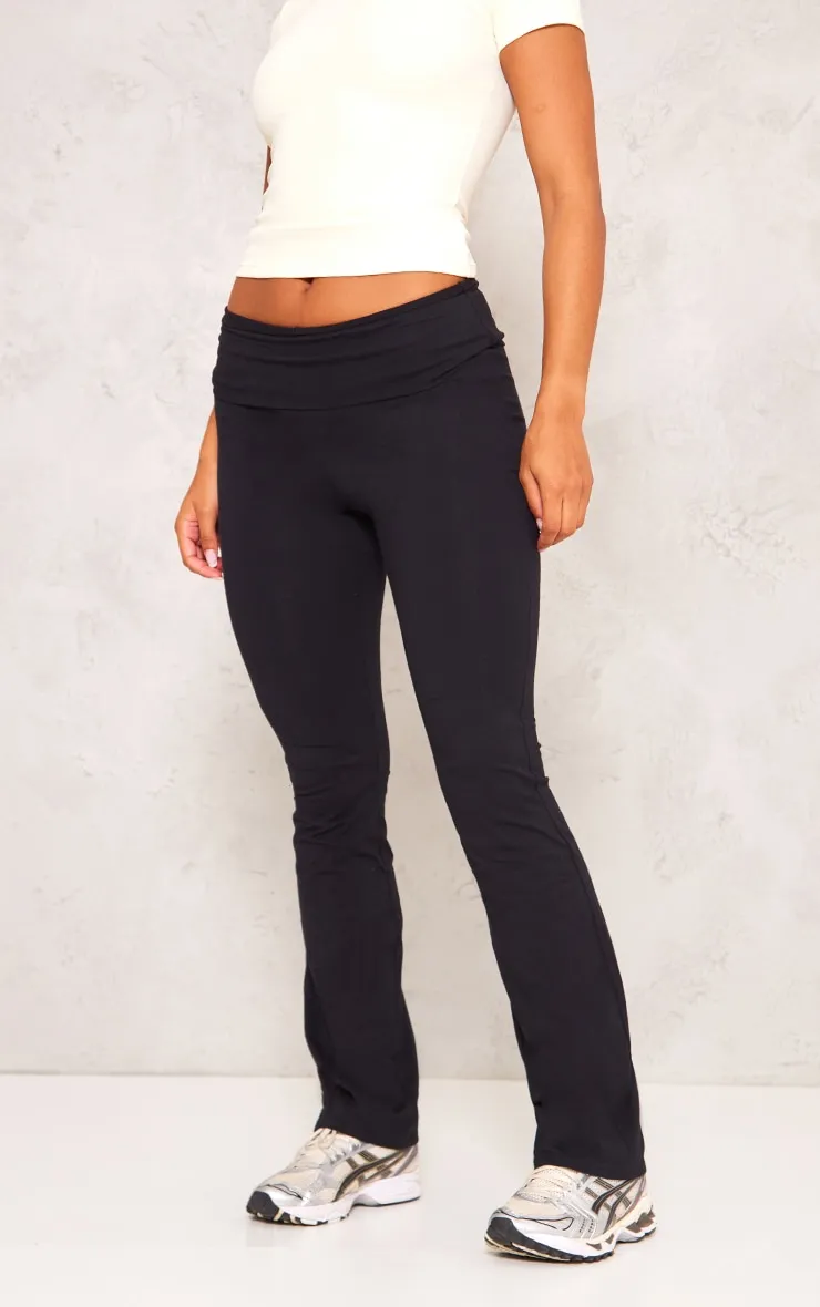 Pantalon flare noir en coton à taille pliée