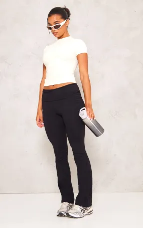 Pantalon flare noir en coton à taille pliée