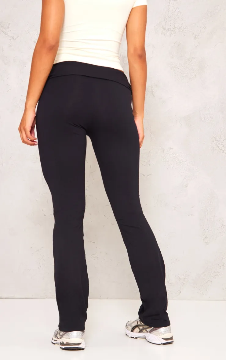 Pantalon flare noir en coton à taille pliée