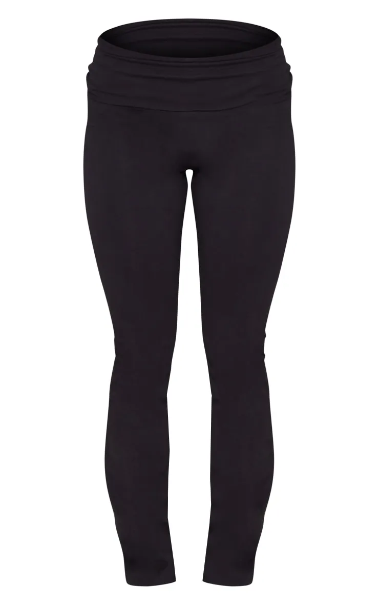 Pantalon flare noir en coton à taille pliée